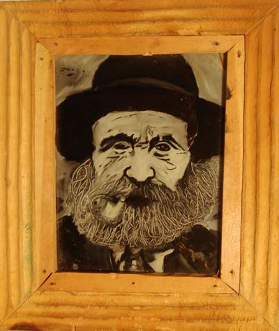 Jakob Tannast (1906-1976), Wiler: Hinterglasbild, eingelegt in ein Holzbrett, das gleichzeitig einen dreifach kannelierten Holzrahmen bildet. Ehemalige Sammlung Albert Nyfeler, Kippel. Das Bild zeigt Augustin Rieder (1836-1926) aus Wiler.